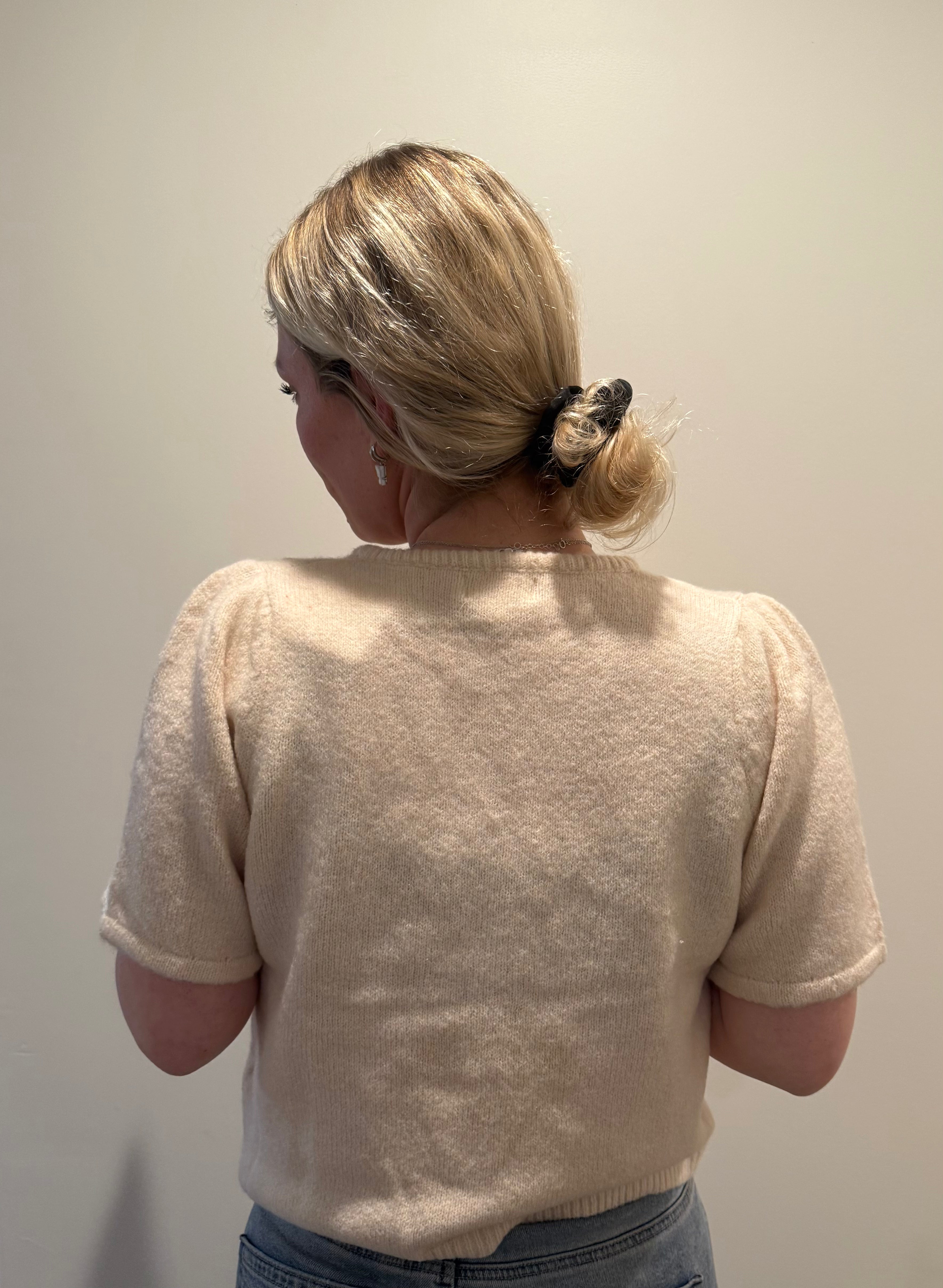 soft knit short sleeve cardigan, ivory knit button top, minimalist women’s sweater, boutique knitwear 2025, puff sleeve knit top, lightweight cardigan for women, elegant knit button tee, feminine minimalist clothing