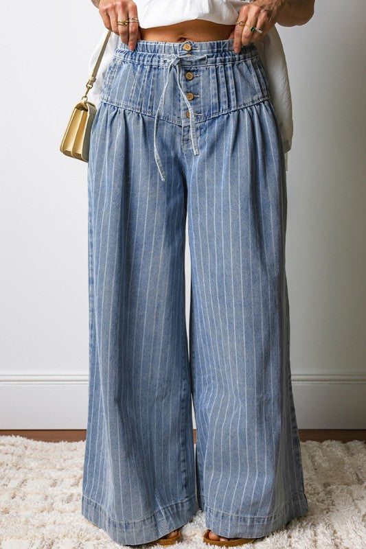 The Brighton Wide Leg Jean features a flattering high waist, elongating vertical stripes, and a statement wide leg silhouette. The perfect elevated denim for everyday chic styling.