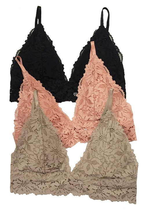 The Misty Rose Lace Bralette features soft floral lace, a flattering triangle silhouette, and breathable stretch comfort in a romantic blush tone. Perfect for layering or everyday wear.
